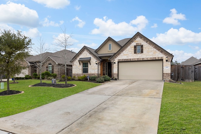 view of front of home featuring a garage and a front yard