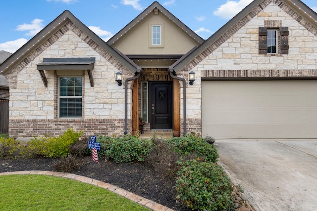 view of front of property featuring a garage