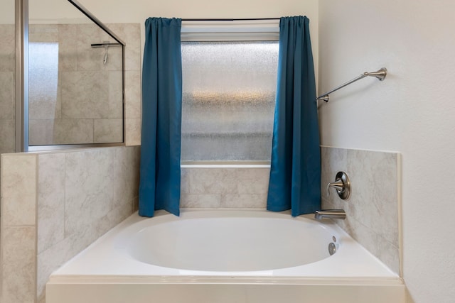 bathroom with a washtub