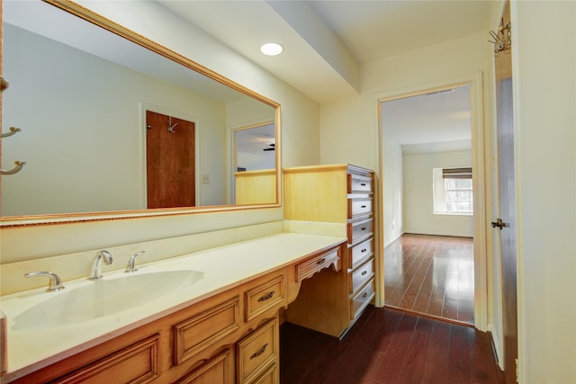 bathroom featuring vanity and hardwood / wood-style flooring