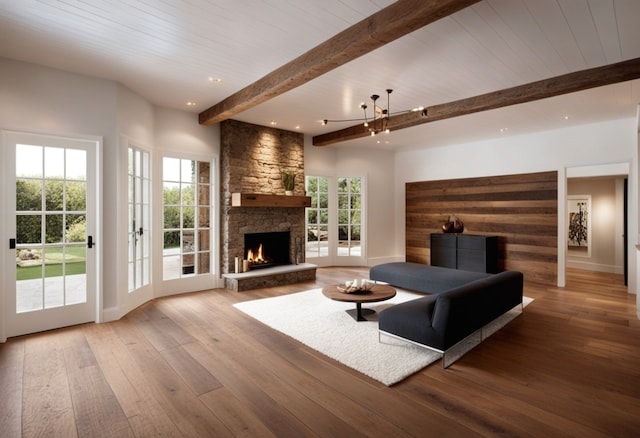 living room featuring wood-type flooring, a stone fireplace, a healthy amount of sunlight, and wooden ceiling