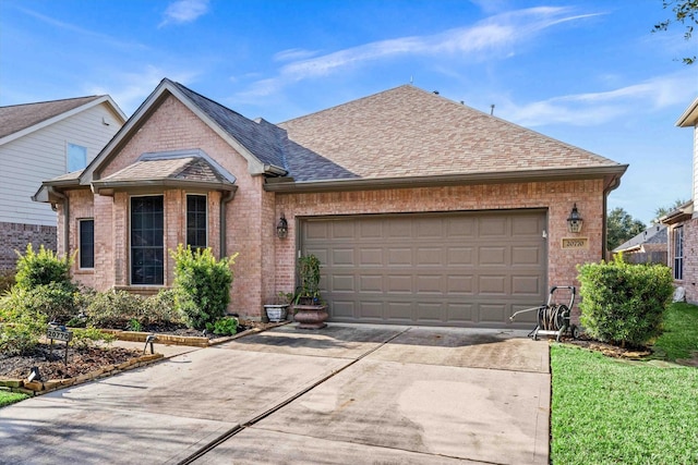 single story home featuring a garage