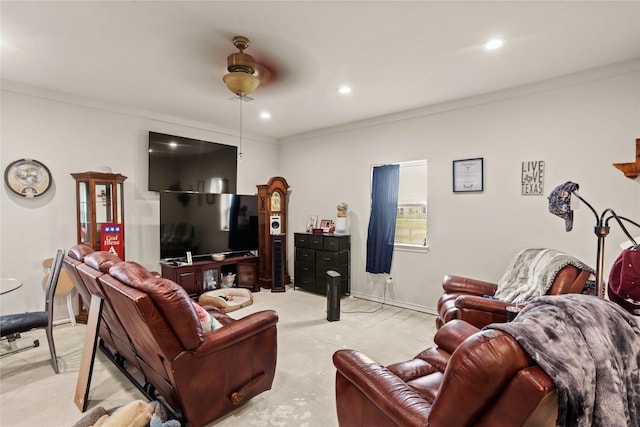 living room with ceiling fan and crown molding