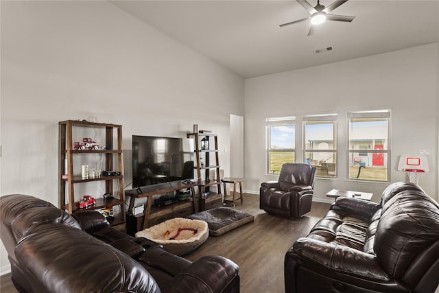 living room with ceiling fan and wood-type flooring