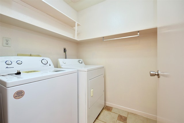 washroom with separate washer and dryer