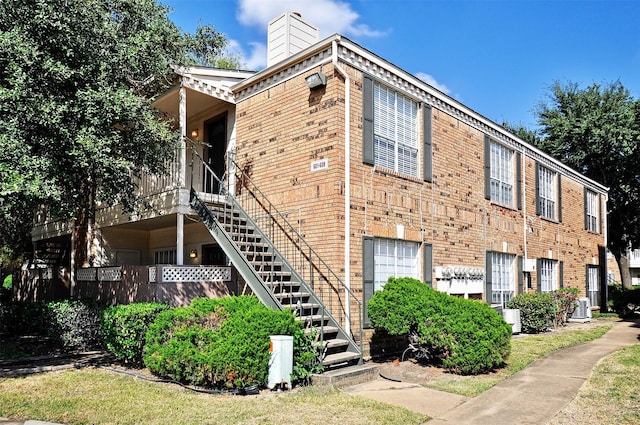 view of property featuring central AC unit