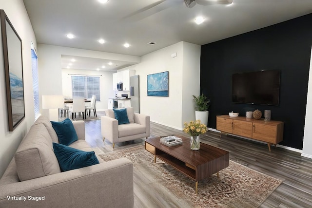 living room with hardwood / wood-style floors