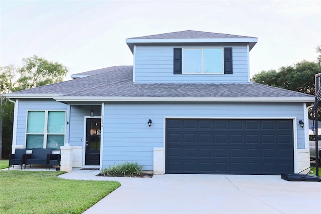 view of front of house with a garage