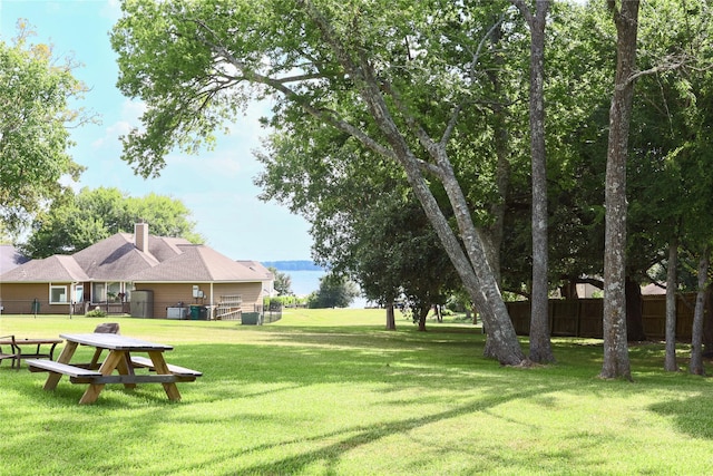 view of community featuring a yard