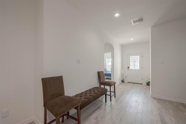 sitting room with light hardwood / wood-style flooring