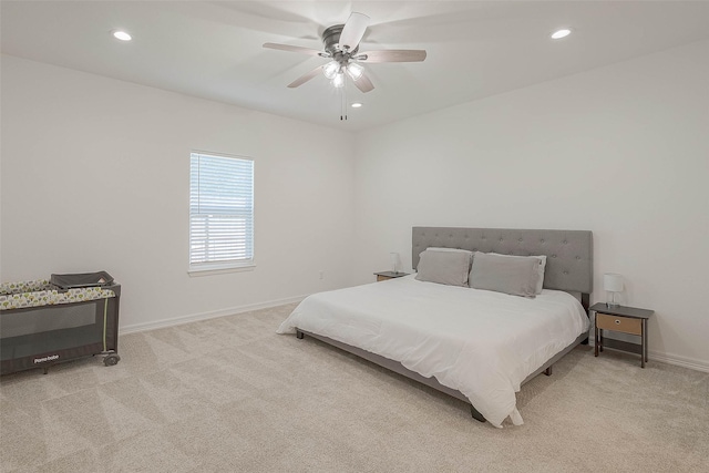 carpeted bedroom featuring ceiling fan