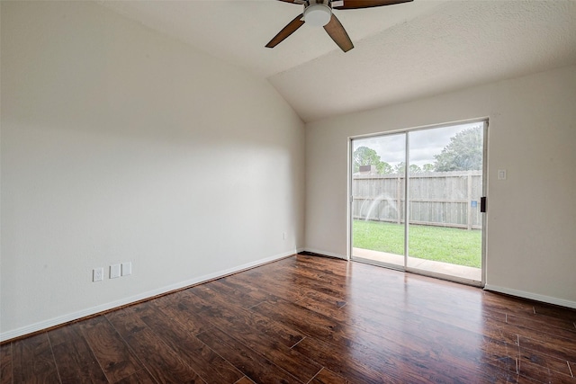 unfurnished room with vaulted ceiling, a ceiling fan, baseboards, and wood finished floors