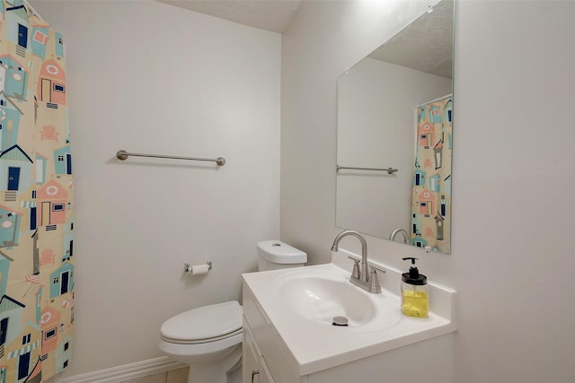 full bath with baseboards, toilet, and vanity