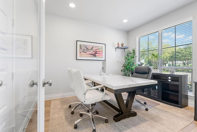 home office featuring light hardwood / wood-style flooring