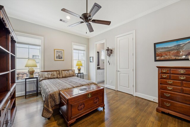 bedroom with ensuite bathroom, ceiling fan, dark hardwood / wood-style floors, and crown molding