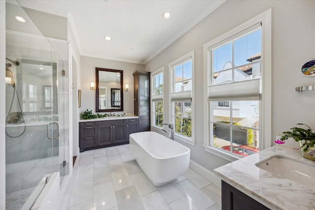 bathroom with vanity, crown molding, separate shower and tub, and tile patterned flooring