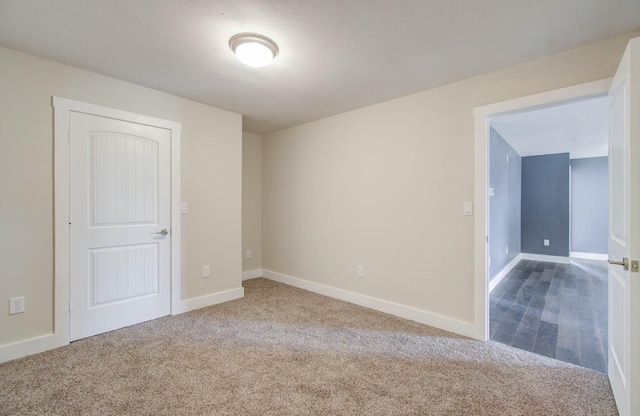 empty room with carpet floors