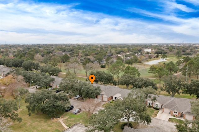 birds eye view of property with a residential view