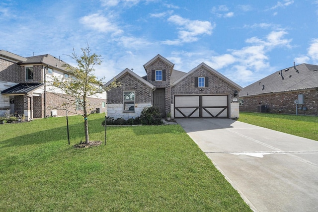 view of front of home featuring a garage, central AC, and a front lawn