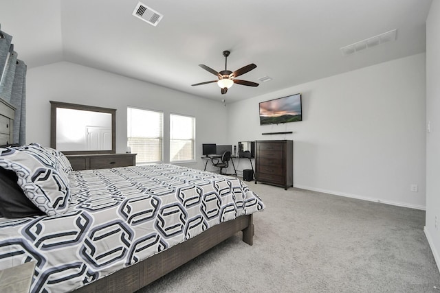 carpeted bedroom featuring ceiling fan and vaulted ceiling