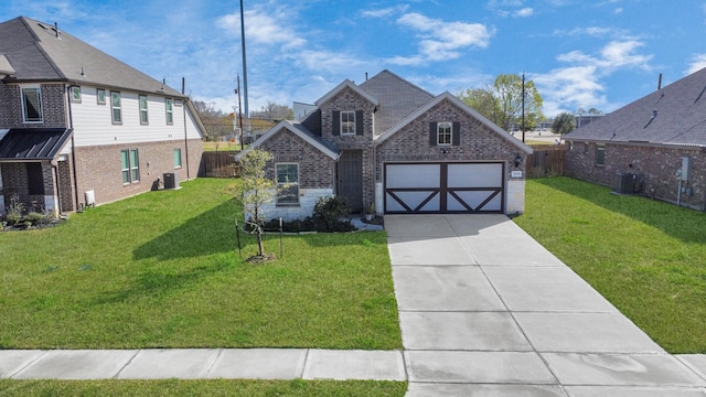 view of front of home with cooling unit, a garage, and a front lawn