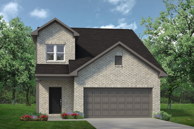 view of front of property with a front lawn and a garage