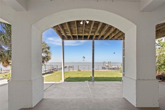 view of patio / terrace with a water view