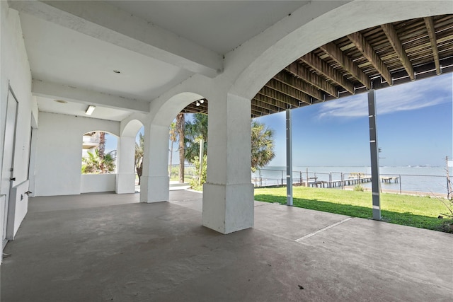 view of patio featuring a water view