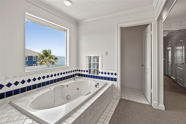 bathroom with tiled bath, a textured ceiling, crown molding, and tile patterned flooring