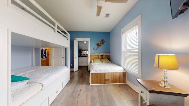 bedroom featuring light wood-type flooring and ceiling fan