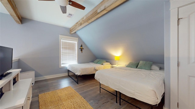 bedroom featuring ceiling fan, vaulted ceiling with beams, and dark hardwood / wood-style flooring