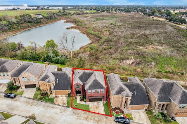 aerial view featuring a water view