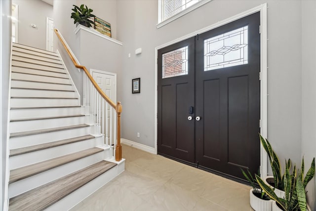 entrance foyer featuring a high ceiling