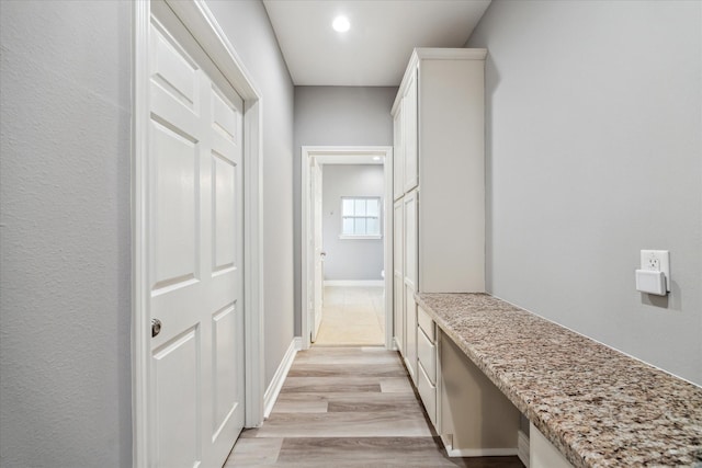 hallway featuring light wood-type flooring