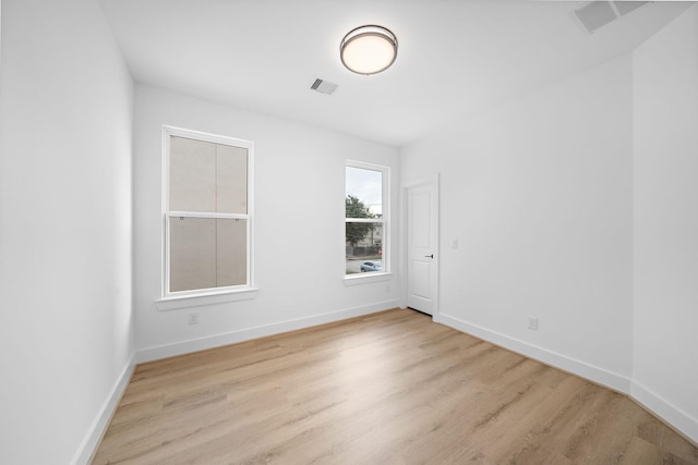 empty room featuring light hardwood / wood-style floors