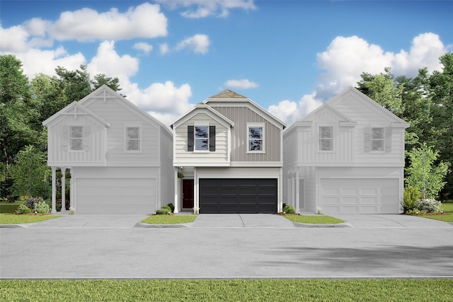 view of front of home with a garage, board and batten siding, and concrete driveway