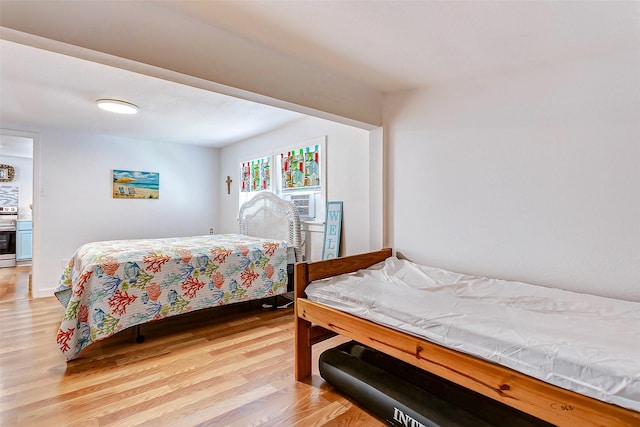 bedroom with light wood-type flooring