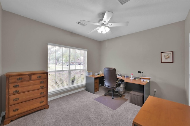 office space featuring carpet and ceiling fan