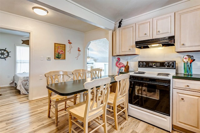 kitchen with backsplash, electric range oven, crown molding, light hardwood / wood-style flooring, and light brown cabinets