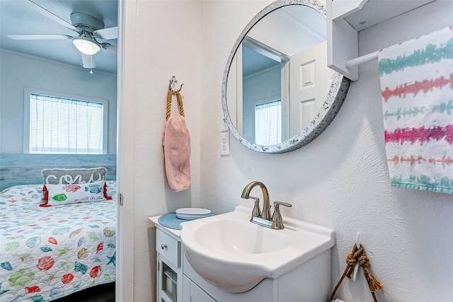 bathroom featuring ceiling fan and vanity