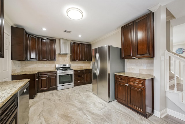 kitchen with backsplash, crown molding, dark brown cabinetry, appliances with stainless steel finishes, and wall chimney exhaust hood