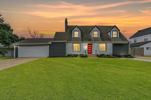 cape cod-style house with a garage and a lawn