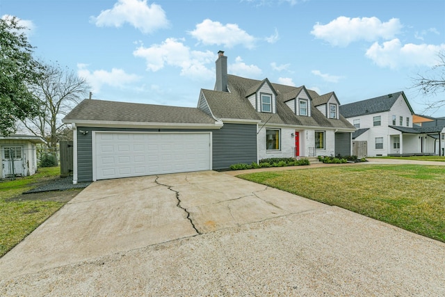 cape cod home with a front lawn and a garage