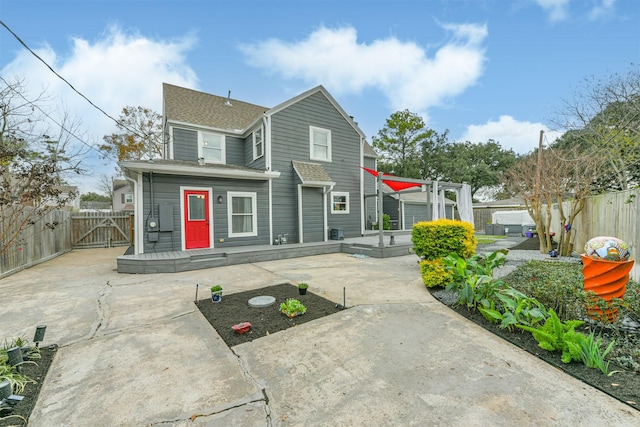 back of property featuring a patio area