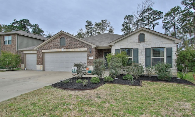 view of front facade with a garage and a front yard