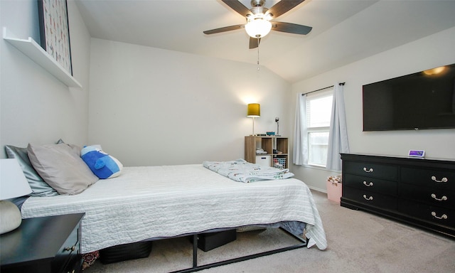 bedroom with ceiling fan, light carpet, and lofted ceiling