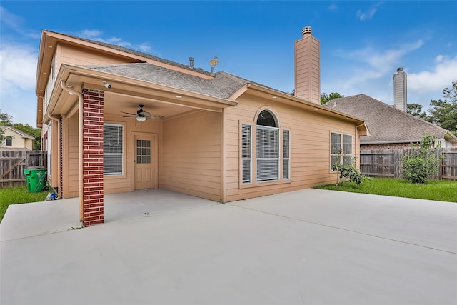 back of property featuring a patio area and ceiling fan