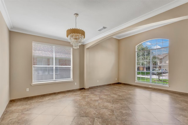 unfurnished room featuring crown molding, plenty of natural light, and an inviting chandelier