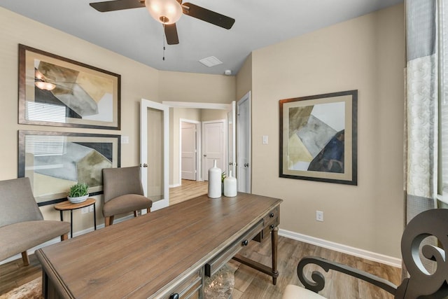 home office with ceiling fan and wood-type flooring