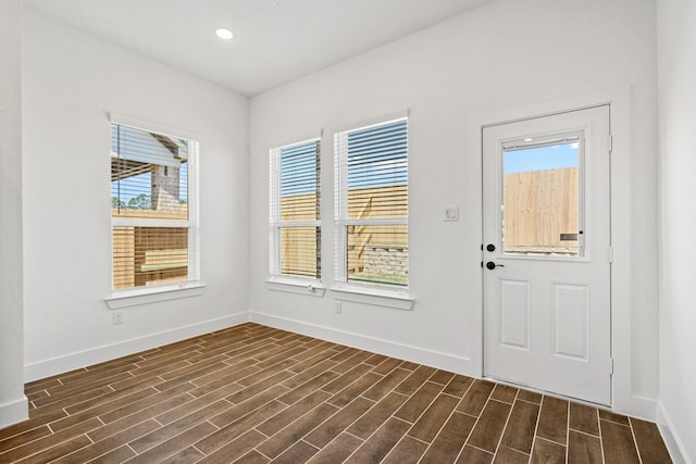 21514 Witham Promenade Ln, Magnolia, TX 77355 - foyer entrance featuring dark wood-type flooring, recessed lighting, and baseboards
